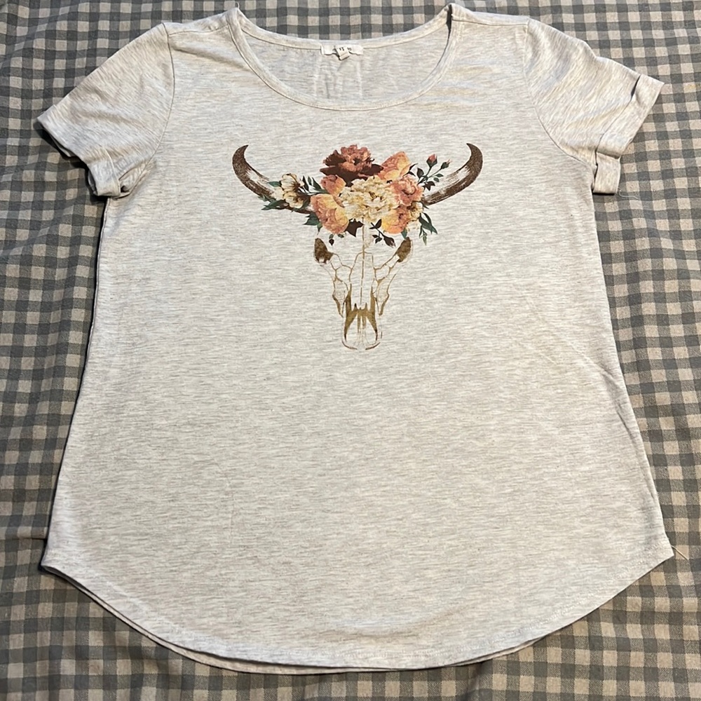 Maurice’s tee shirt